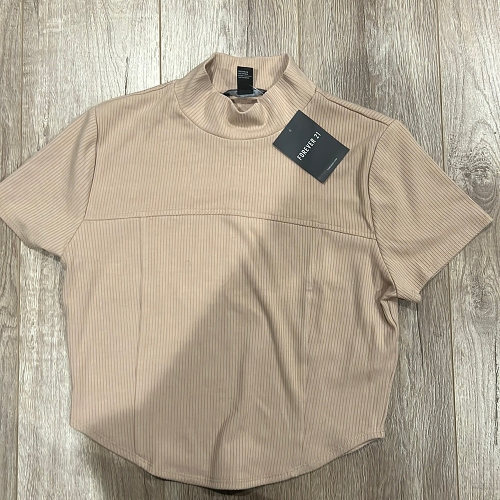 Kind of cropped blouse cream color never worn